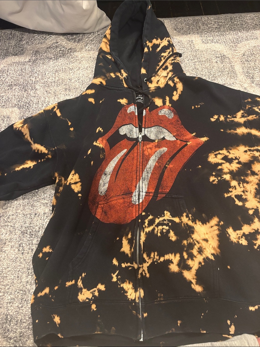the Rolling Stones Black & Orange Tie-Dye Zip Hoodie with Tongue Logo